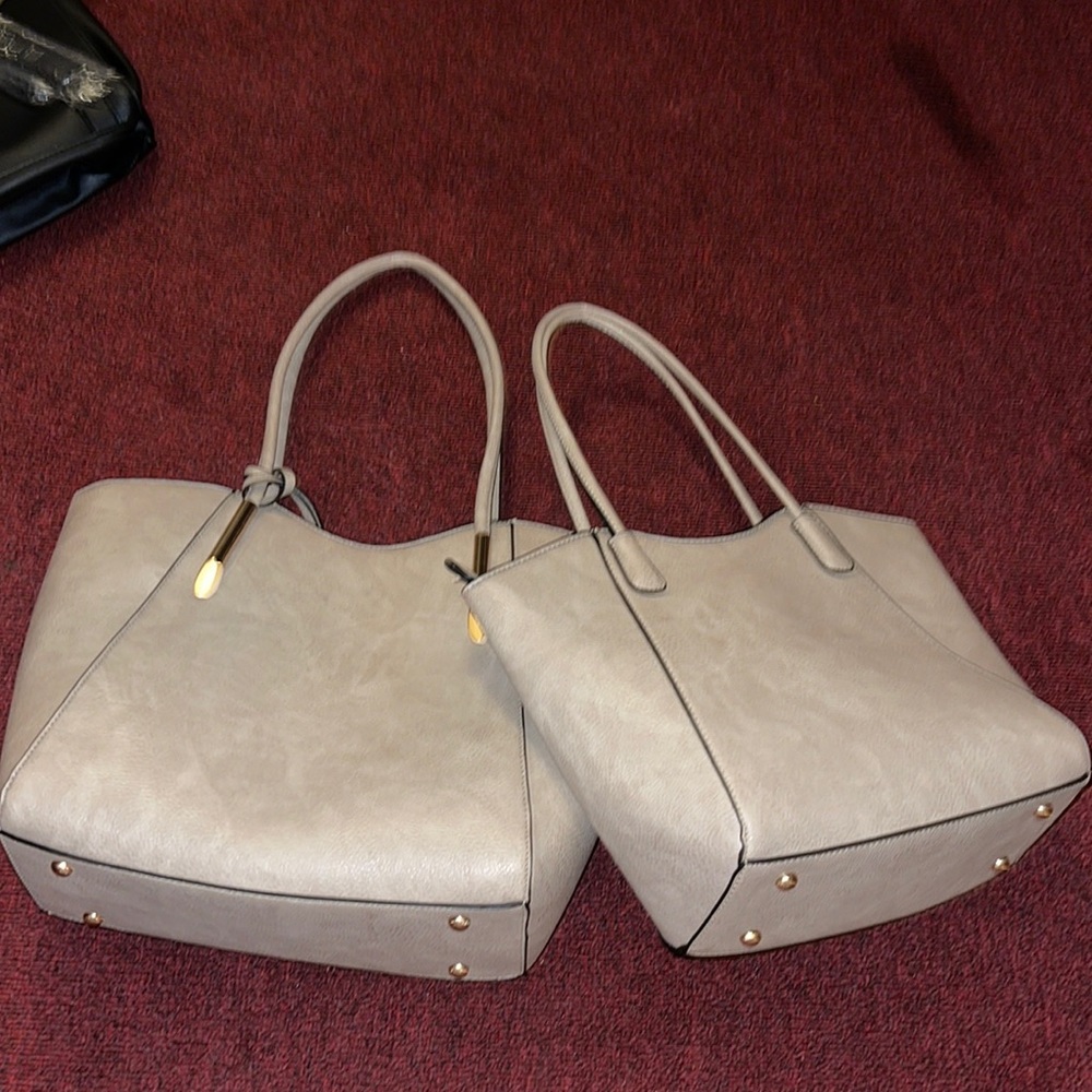Two matching purses with a wallet/clutch attached to larger bag. Barely used.